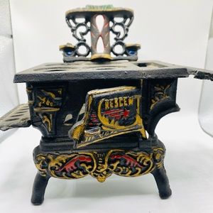 Colorful salesman sample doll stove